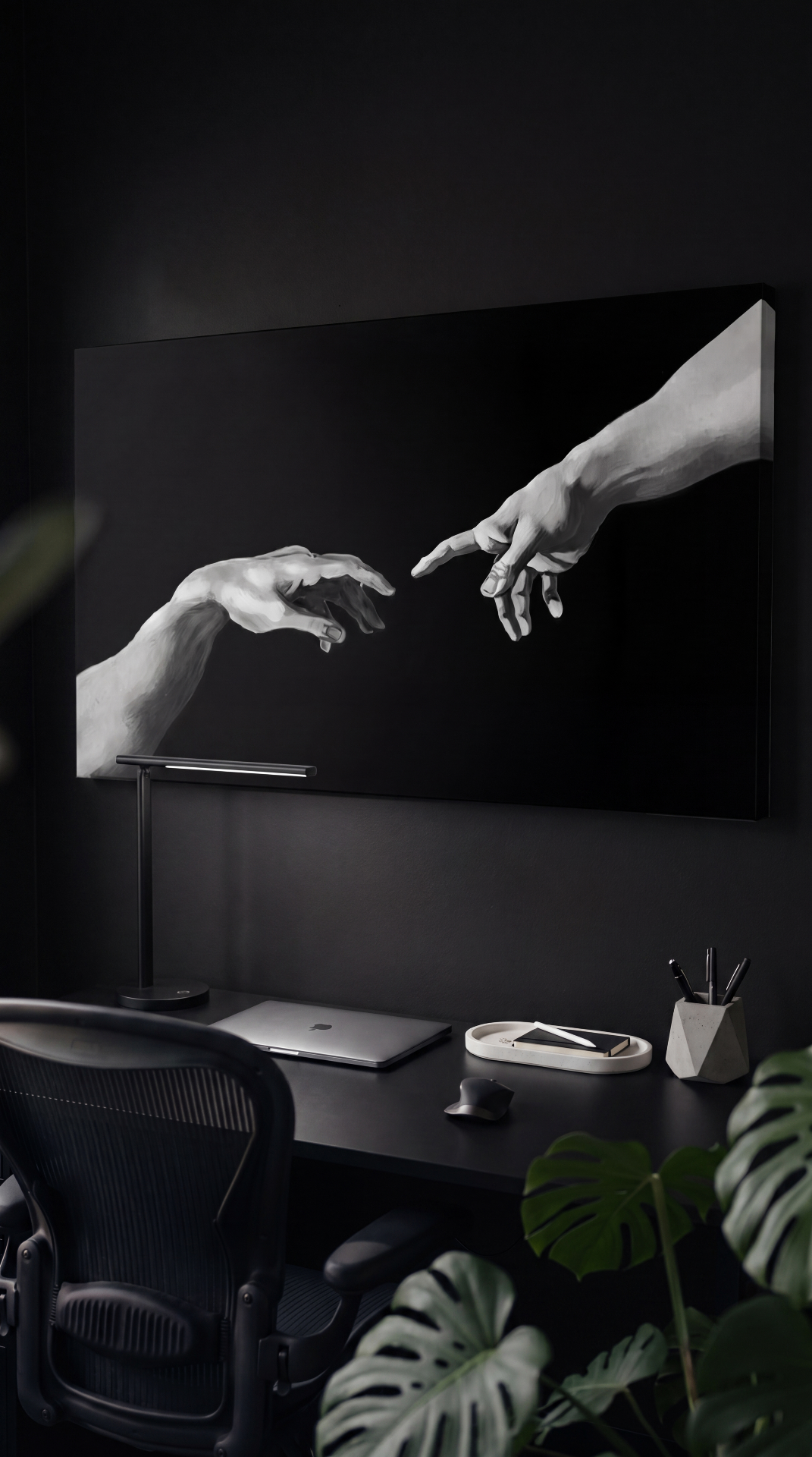 The Reach, archival canvas edition, hung above a dark studio desk